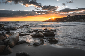 Cloudy sunset at Cala Cipolla at Domus De Maria Sardinia