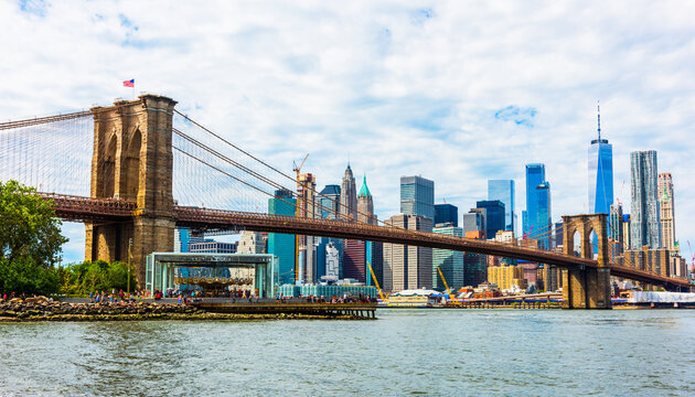Brooklyn Bridge with skyscrapers background. New York City, USA.