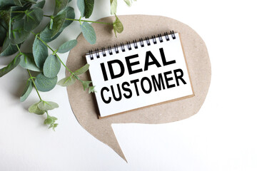 IDEAL CUSTOMER, TEXT ON WHITE paper on a light background
