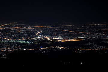 Fototapeta premium Aerial view of the night light cityscape of Chiang mai, Thailand