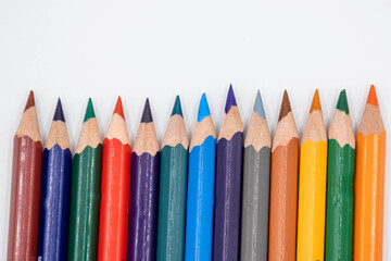 colorful pens on a white background