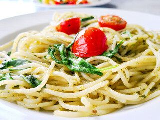 Tasty pasta with salmon on a the table