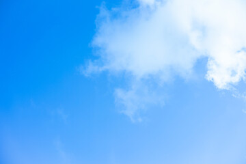 Naklejka na ściany i meble White clouds with blue sky Background On a bright day with copy space for text or banner for website