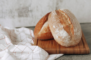 Fresh homemade crisp bread, soft focus. French bread. Bread at leaven. Unleavened bread.