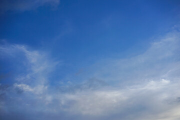 Soft clouds and blue sky with copy space for banner or wallpaper background