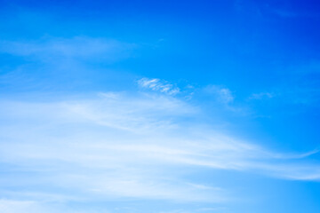 Naklejka na ściany i meble White clouds on blue sky with copy space for banner or wallpaper background. freedom concept