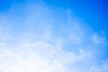 Obraz premium Beautiful White clouds on blue sky with copy space for banner or wallpaper background. freedom concept