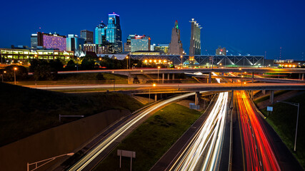 Fototapeta premium image of the Kansas City skyline and busy highway system leading to the city.