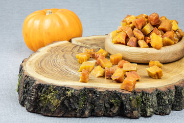 Pumpkin candied fruits on the wood board