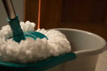 Round spin mop with microfiber head. plastic spin mop bucket. Cleaning mop and bucket
