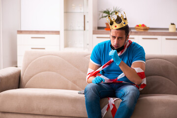 Young man suffering at home in pandemic concept