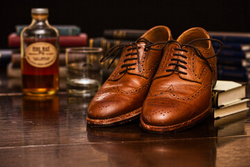Shoes on wooden table.