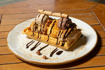 Waffle served with ice cream at the restaurant