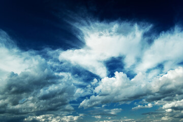 Naklejka na ściany i meble Panoramic of beautiful cloud in blue sky. Panorama of blue sky and white cloud nature background. Blue sky background with cloud. Dramatic sky with stormy clouds.