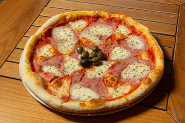 Pizza Margherita served on a plate