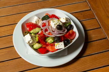 Tomato, olive, cheese, cucumber and olive salad