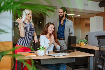 Young business people discussing something in the office