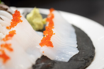 Fresh of raw squid and salmon eggs, Japanese food style.