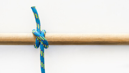 Clove hitch knot on a white background