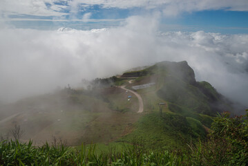 Misty clouds cover mountains in Thailand.