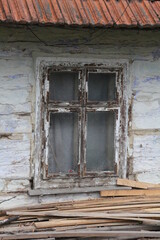 old window damaged in a rural wooden house in the countryside