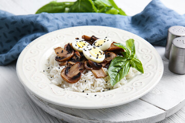 Plate of delicious rice salad with vegetables, closeup