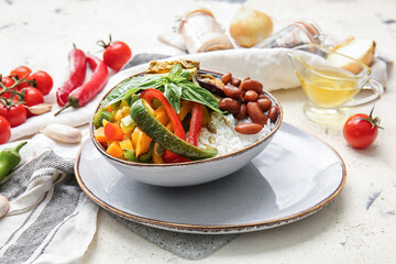 Plate of delicious rice salad with vegetables closeup