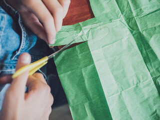 Girl making crafts,no faces shown