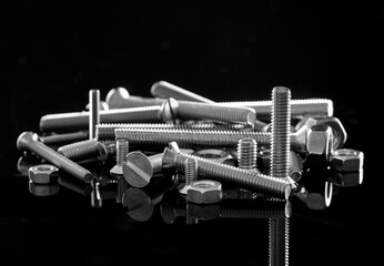 Pile of metal bolts and nuts