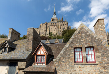 Fototapeta premium Ancient buildings of the old town on the famous Mont Saint Michel island in France