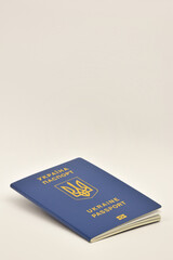 International passport of citizenship of Ukraine close up on a white background