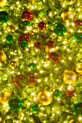 Obraz na płótnie Canvas A close up of a Christmas tree and lights.