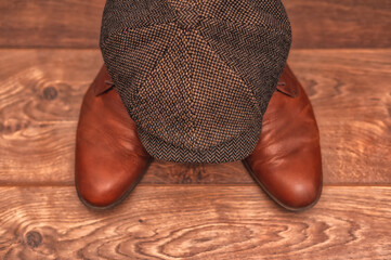 Men's clothing and accessories on a wooden background in warm colors