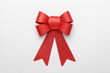 Red bow on white background