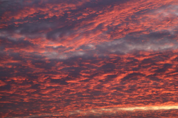 red sky with clouds