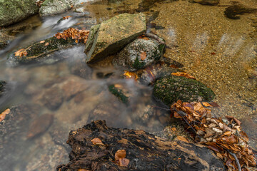 Maly Bily Stolpich waterfall in autumn fresh morning in Jizerske mountains