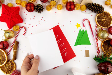 DIY step-by-step instructions for a Christmas card with children. Volumetric tree on a postcard...