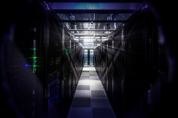 Network servers in a data center. Tier III carrier neutral data center. Server rooms.