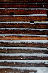 closeup background of old wood planks under snow