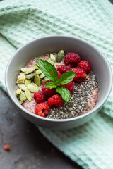 Healthy breakfast flavoured by berries and superdfoods