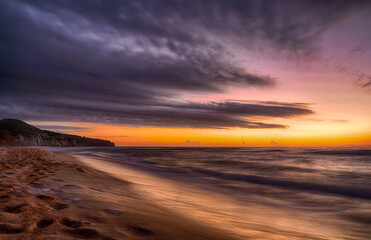Fototapeta na wymiar long exposure at sunset on the beach