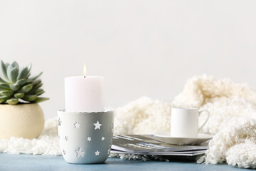 Beautiful aroma candle on table in room