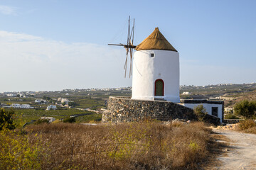 Old windmill in Emporio village on the south side of Santorni. Cyclades Islands, Greece
