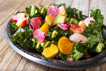 A view of a plate of kale and beet salad.