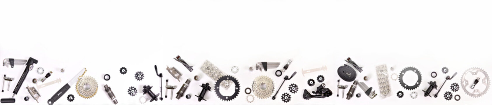 Bicycle parts on a white background.