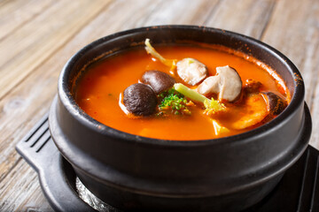 A view of a bowl of soon tofu soup.