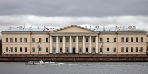 Fototapeta na wymiar Building of the Russian Academy of Sciences on the University embankment of the Neva river.