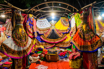 Fototapeta na wymiar Colorful handicrafts for sale in Law Garden. Ahmedabad