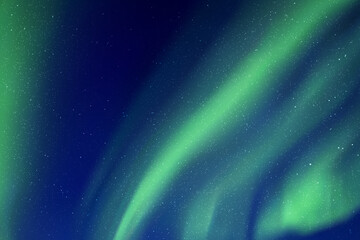 Night starry sky and Northern lights. Green aurora borealis - obrazy, fototapety, plakaty