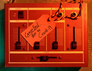 cancellation of cultural events due Covdi-19 lockdown, mixing desk and cancellation note, symbol...